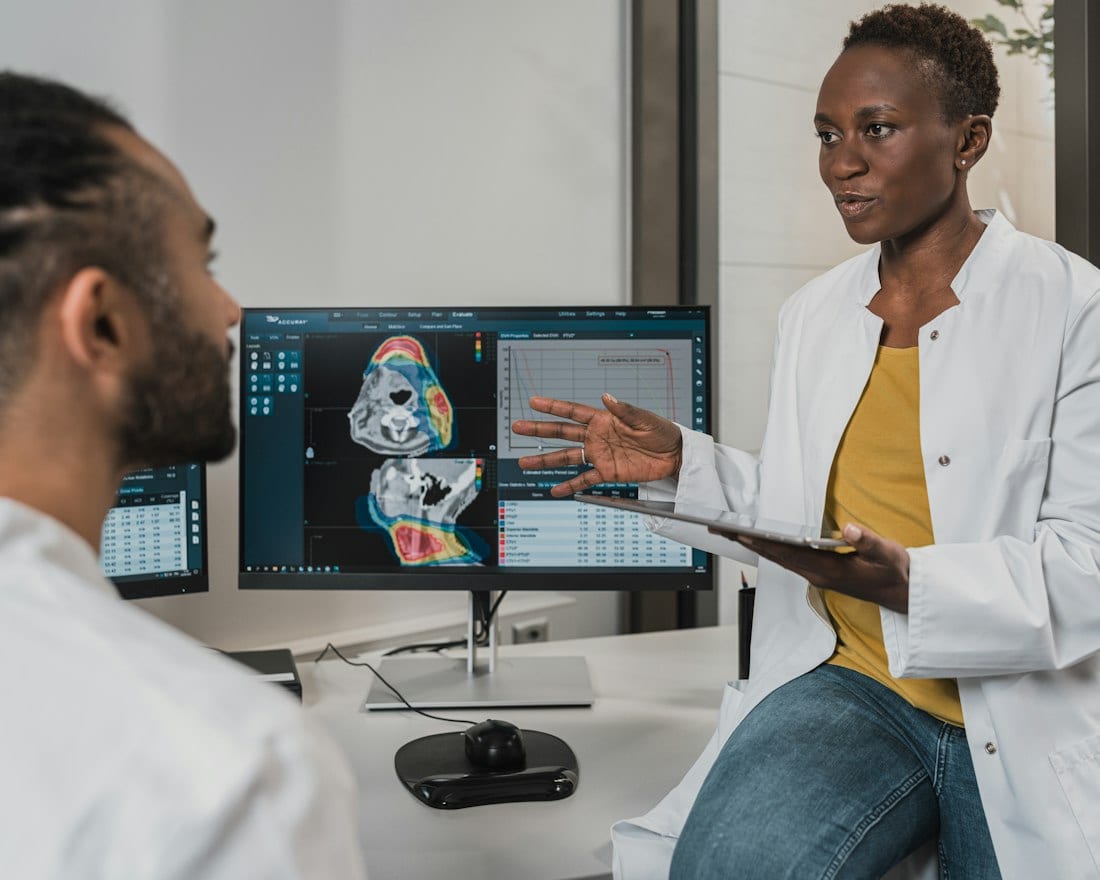Clinical research staff reviewing a case together at an investigational site